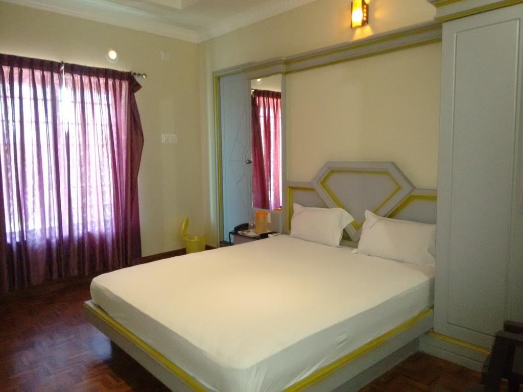 Hotel Chithra Kanyakumari Rum bild