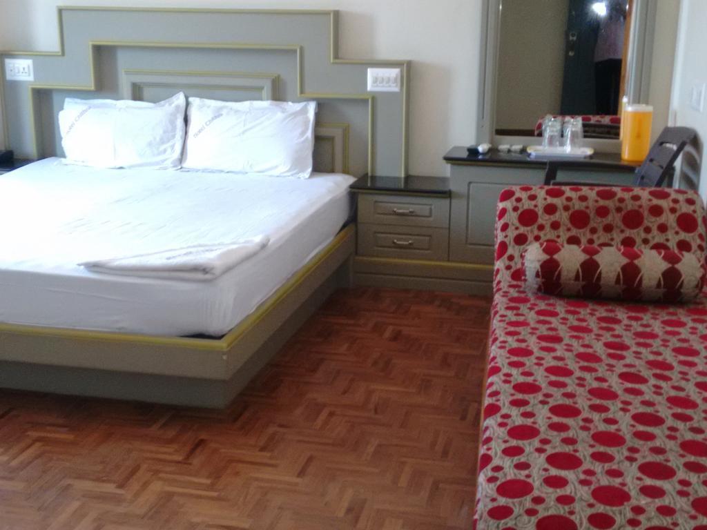 Hotel Chithra Kanyakumari Rum bild